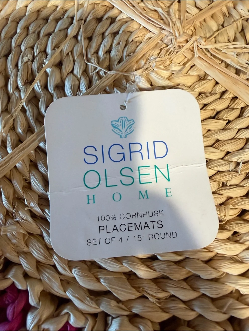Handcrafted Round Cornhusk Placemat with Fuchsia Scalloped Border sigrid olsen